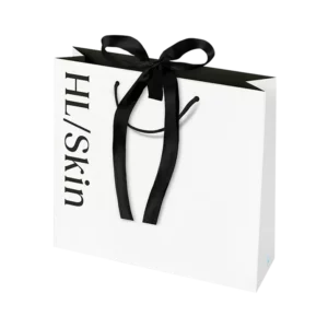 Bolsa de regalo grande HL/Skin blanca con cinta negra, elegante presentación para productos de belleza