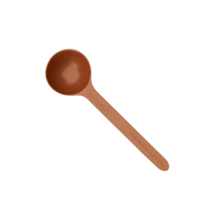 Cuchara medidora marrón Herbalife para High Protein Iced Coffee.