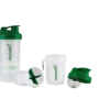 Shaker Herbalife transparente con tapa verde y compartimentos desmontables.